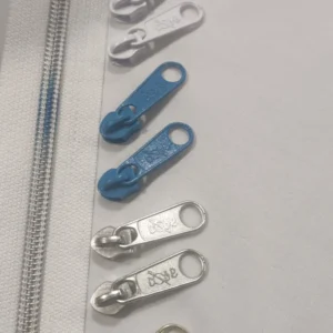 Fecho Zipper Malha 5+ Cursor | Cose | Pack 5 metros | Branco/Iridescente 1099